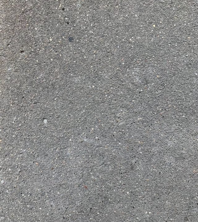 High-resolution image of a seamless gray concrete texture, ideal for backgrounds.